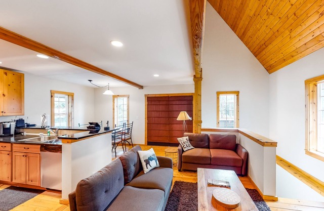 Mountainside home with a private deck, balcony, bright interior & foosball