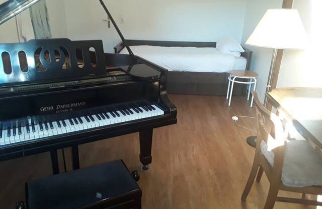 Musician's apartment in a cozy backyard ambience
