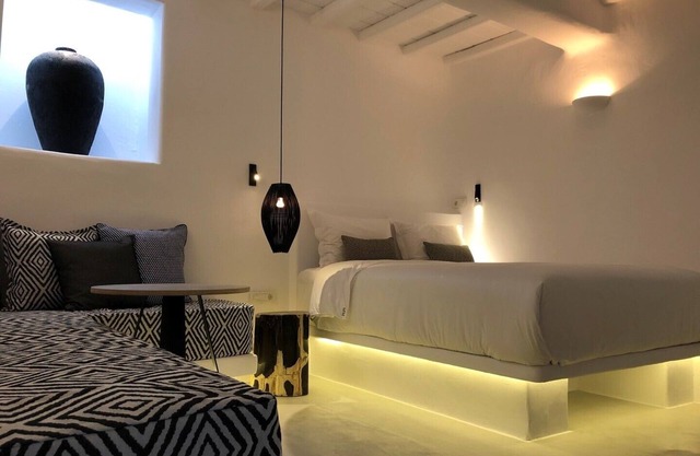 Mykonian Mews H1 Luxury Cave Suite with outdoor jacuzzi, lounge and cuisinette