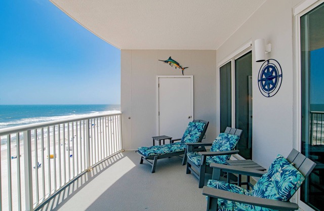 "Nautical Retreat" A Luxury Beachfront Condo just steps from the beach!