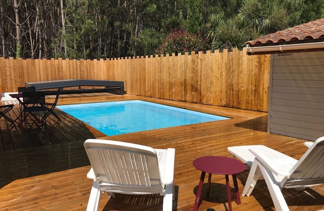 Near Soulac/mer 50M² air-conditioned chalet with private heated indoor pool