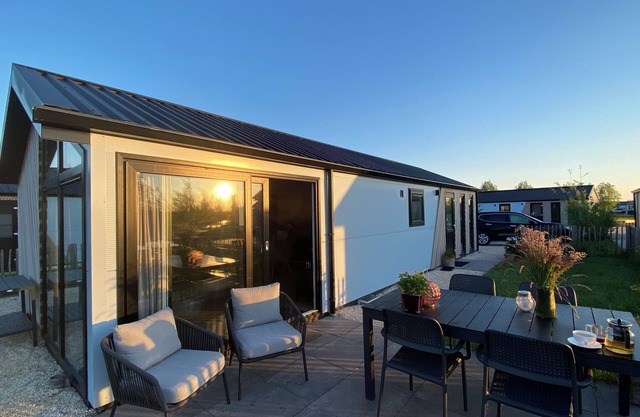 NEW Elegant waterfront chalet with jetty Lake Kampen Netherlands vacation home boat