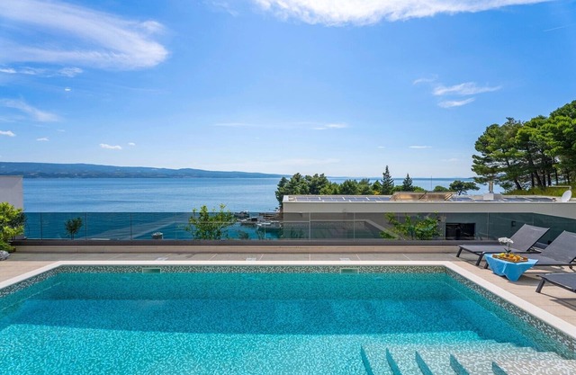NEW! Luxury, seafront Villa IVAN with heated pool only 100m from beach