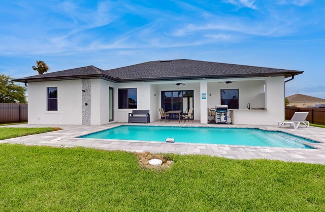 New modern home with pool, lawn, W/D, Wifi and AC