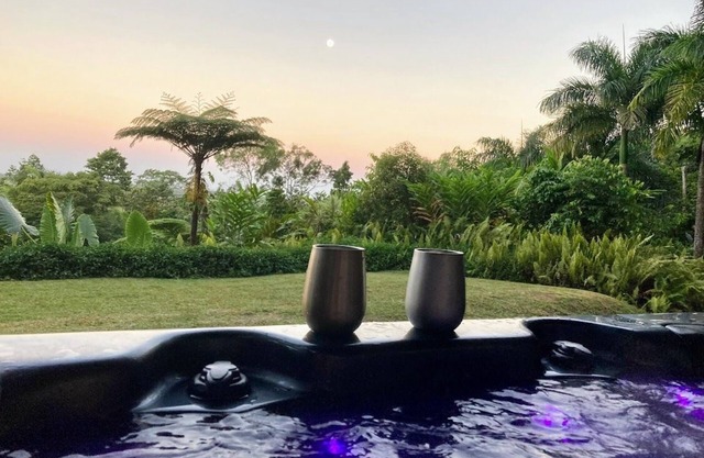 NEW -The Sugar Shack, Ocean views over cane fields from your outdoor Spa Bath