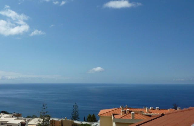 New top-floor 2-bedroom apartment with private sun terrace with ocean views