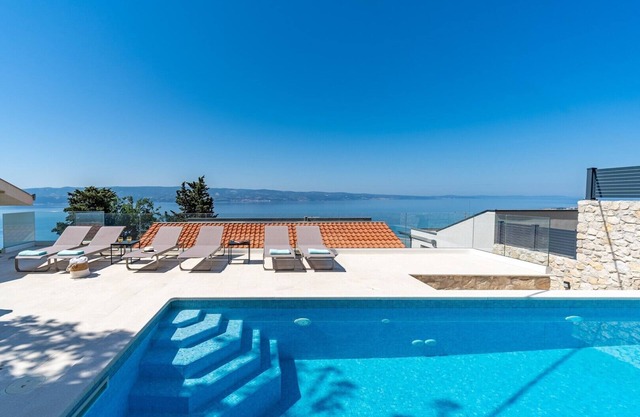 New! Villa Atopos with heated private pool, 5 bedrooms, Cinema room, panoramic sea views
