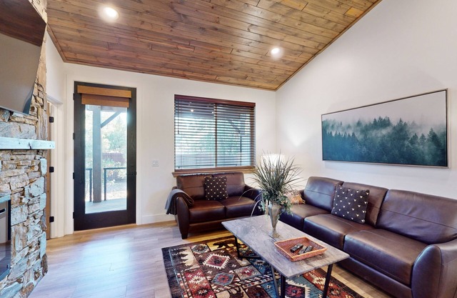 Newly built condo with gas fireplace, mountain views, deck, central AC