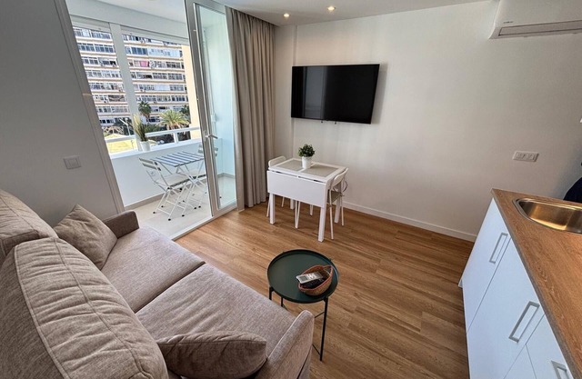Newly renovated apartment with balcony, pool, and parking.