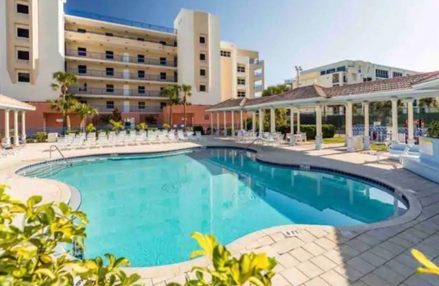 Newly renovated condo with scenic views, two pools and steps away from the beach