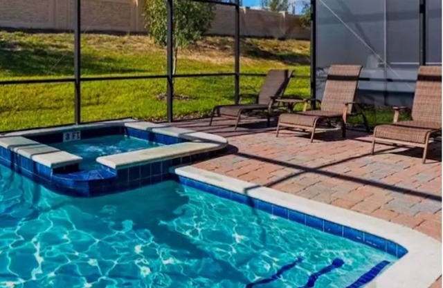 Newly Renovated Luxurious 8BR Oasis- Pool, Spa, Home Theater, Steps from Disney