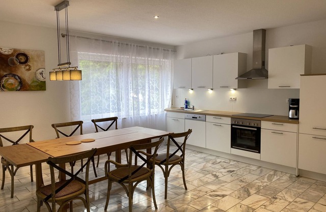 Newly renovated, very spacious 3-room apartment with terrace, garden, parking space