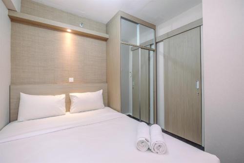Nice and Fresh 2BR at Bassura City Apartment By Travelio