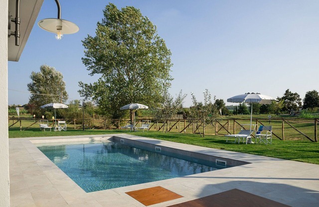Nice apartment in villa for 2 guests with WIFI, A/C, pool, TV and parking