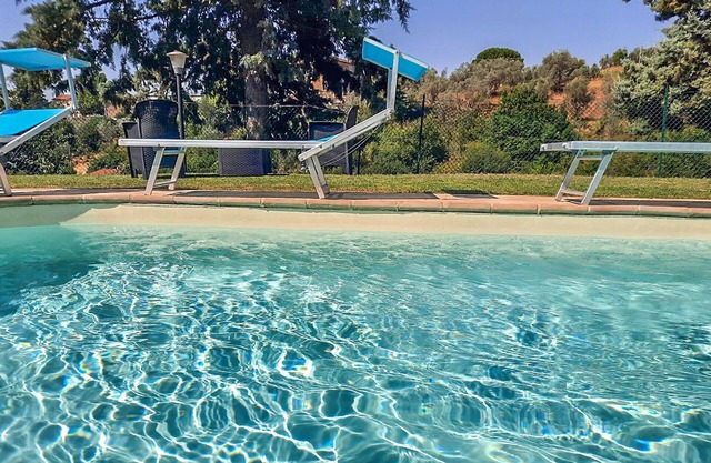 Nice cottage on the hillside with pool and beautiful view.