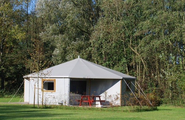 Nice glamping tent with wood stove at a holiday park in the Achterhoek