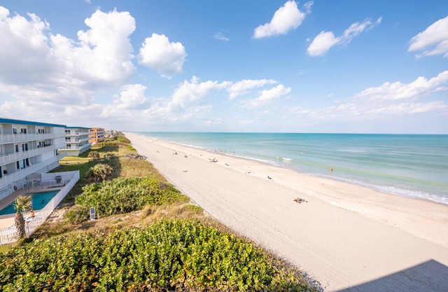Ocean front corner unit with quiet beach