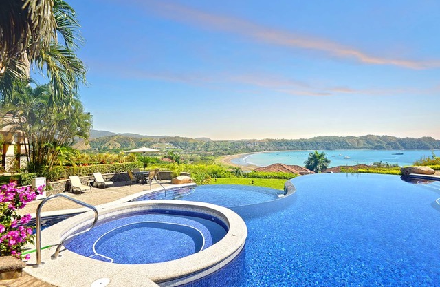 Ocean View Luxury Condo next to pool + access to all amenities.