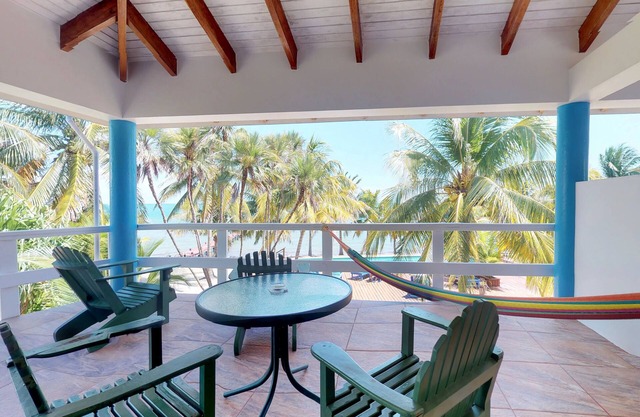 Oceanfront condo with shared pool, sea view, central AC & WiFi - walk to the beach