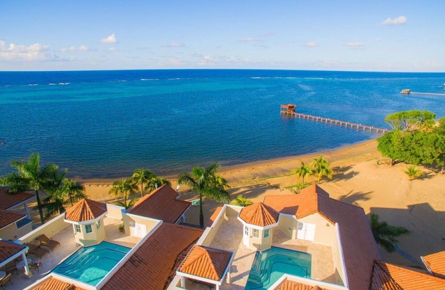 Oceanfront condo with private rooftop pool in gated community