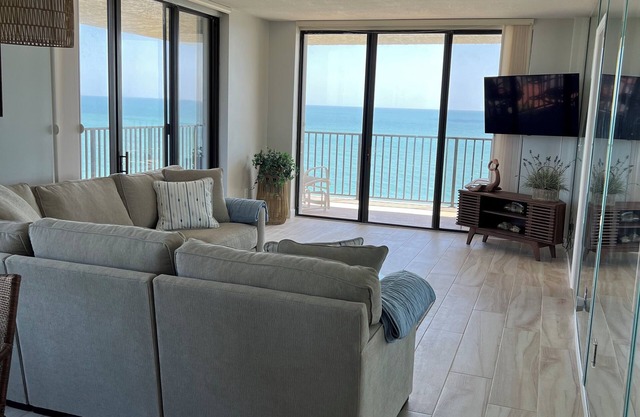 Oceanfront corner unit with wrap-around balcony