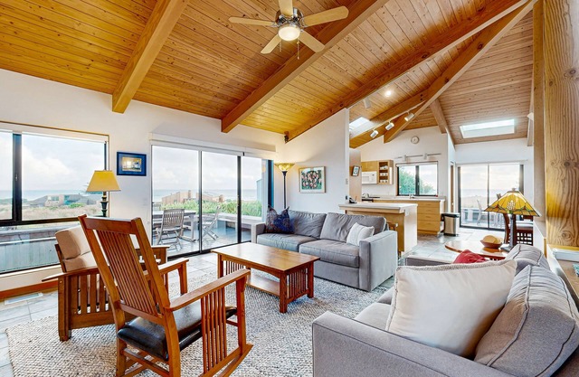 Oceanview bluff home with private hot tub, shared pool, saunas, tennis, & EVC
