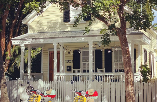 Old Town Classic with plenty of charm, porch swing and parking