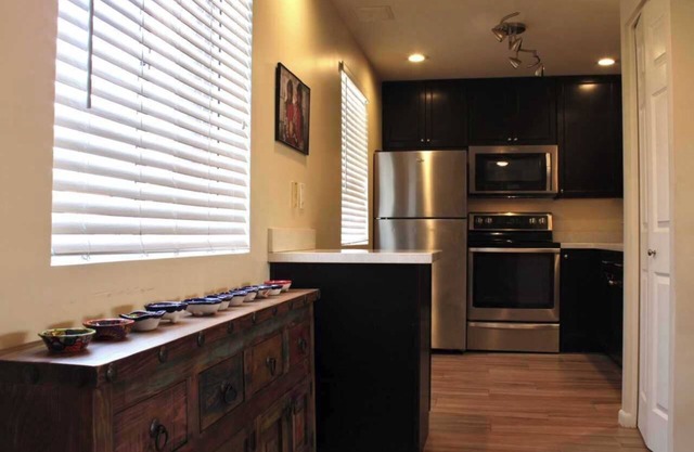 Old Town, Fashion Square, Camelback Mountain surround this Cozy Condo.