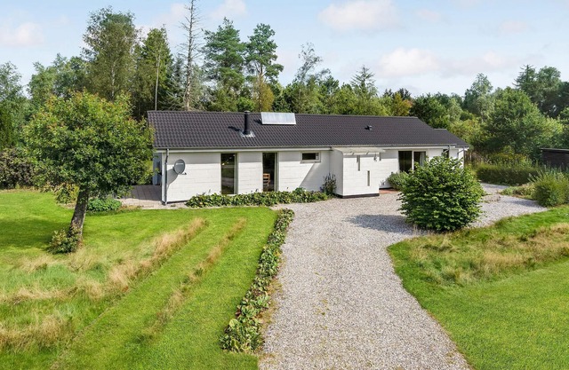 On a beautiful natural plot with garden awaits you this vacation home with space for the whole famil