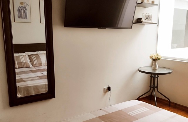 One-bedroom apartment with studio and private bathroom in residential area
