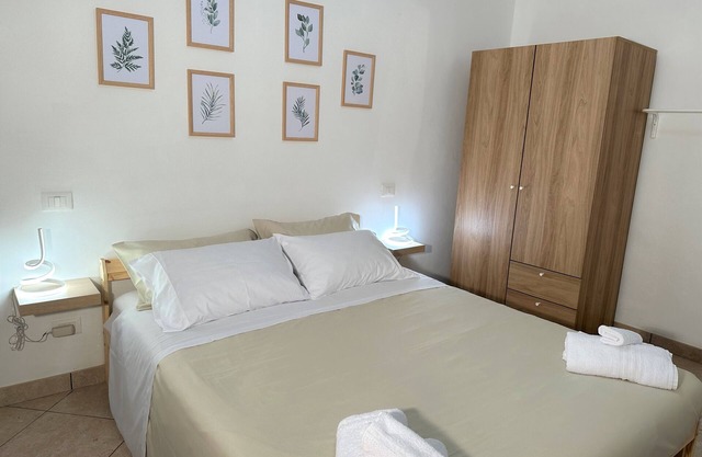 Only 1 minute walk to the Beach, house with terrace and large porch.