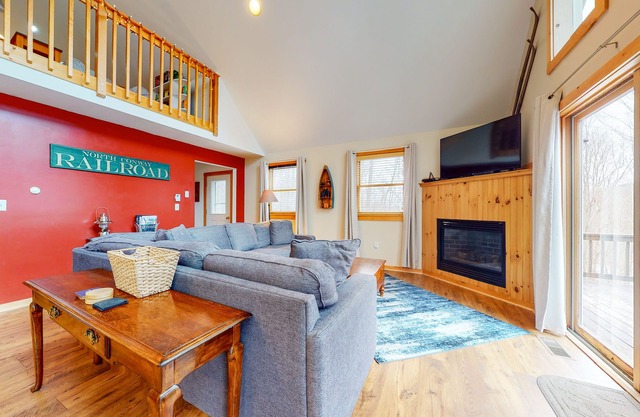 Open concept home close to the beach with gas fireplace and deck