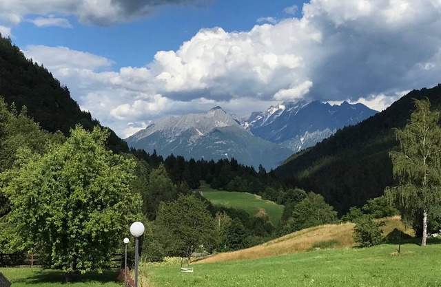Open in relaxation with a view of the Adamello