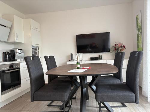 Ostfrieslands Perle Ferienwohnung an der Nordseeküste, Sauna, Terrasse, Garten, ruhige Lage, WLAN