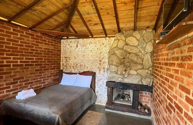Our cabin at the top of the property with verandah and veranda