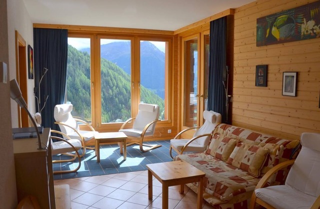 Outside : luxury modern apartment on the ground floor of a chalet, for 6-7 persons, terrace with a b