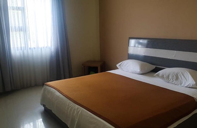 OYO 91266 Markoni 18 Guest House