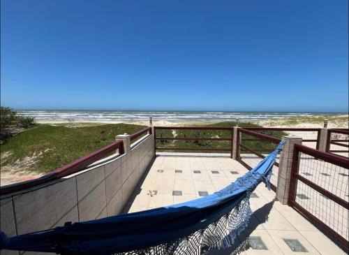 Pé na areia - AP beira-mar
