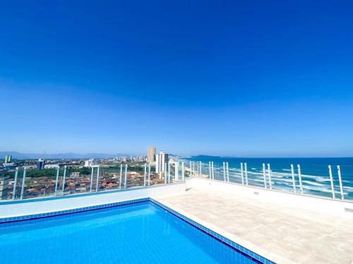 Pé na areia: apto com vista mar e piscina