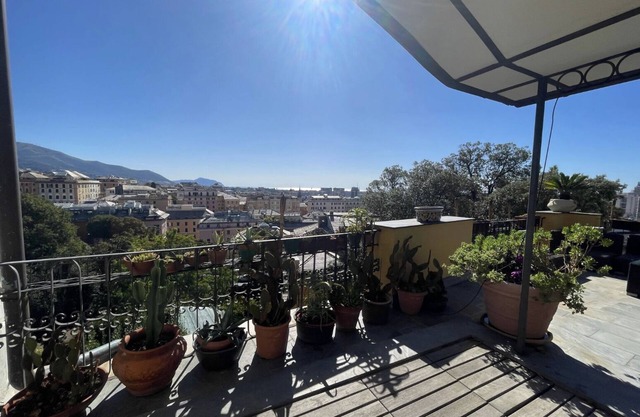 panoramic roof terrace with pergola: Genua Domus penthouse 010025-LT-1478