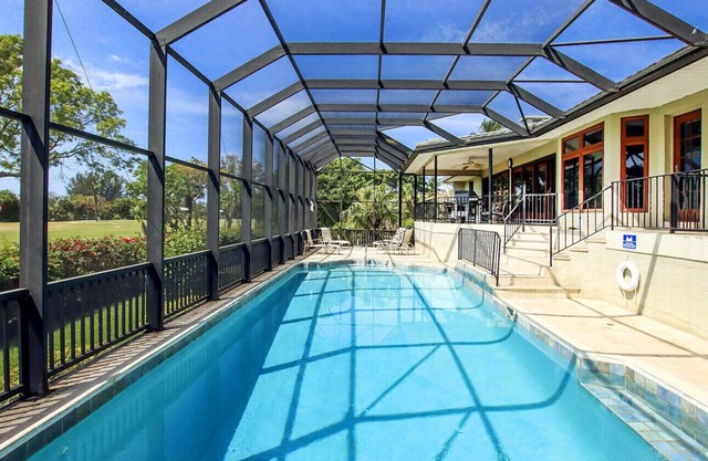 Par View Beachview Estates Home with private pool and golf course views