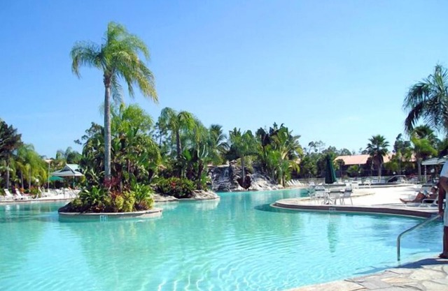 PARADISE FOUND! LAKEFRONT FIRST FLOOR CONDO IN TROPICAL FALLING WATERS