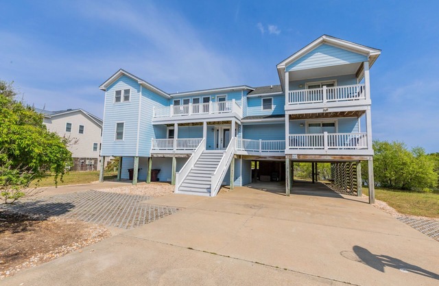 Peaceful lakefront views with private saltwater pool, large scale living, and wonderful amenities