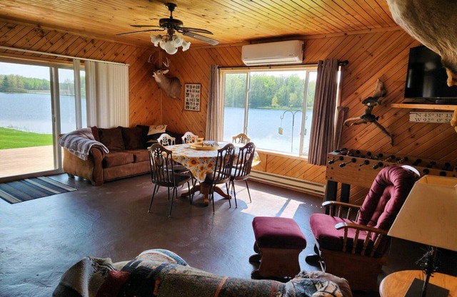 Peacefully secluded cabin on a small private lake with 55 Acres