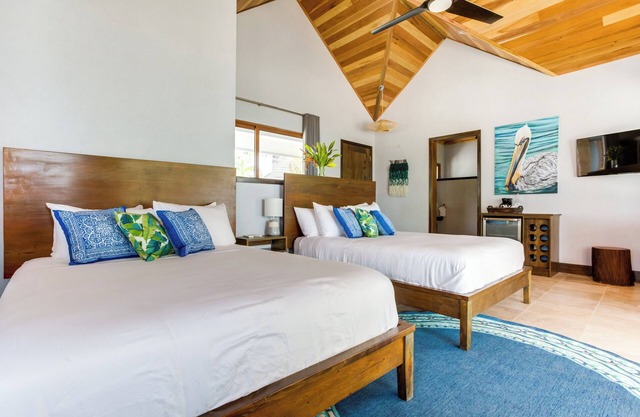 Pelican: Beachfront Cabana with 2 Queen Beds on Private Island