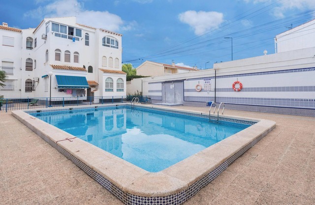 Penthouse Apartment Near the Beach with Sea View, Pool, Wi-Fi, A/C & Terrace