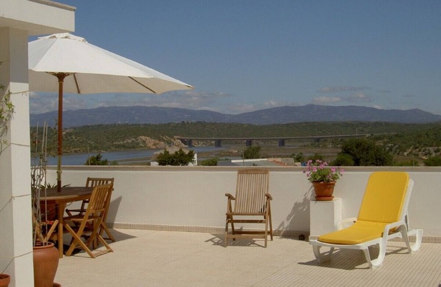 Penthouse apartment with stunning private roof terrace, river and mountain view