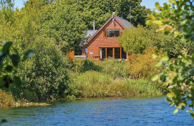 Perfectly positioned with panoramic views of the lake.