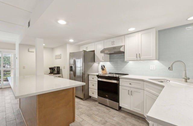 Pet Friendly | Ground Floor Sailmaker Villa | Covered Patio with Pool View
