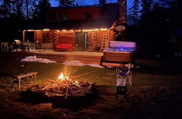Pet-friendly log cabin with hot tub near hiking, fishing, etc.